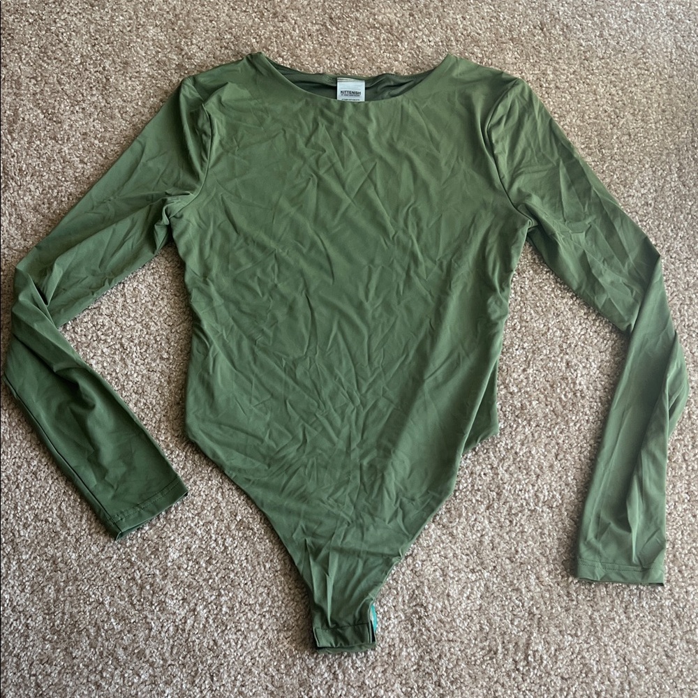 Kittenish crewneck long sleeve bodysuit